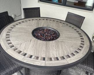 Agio high top fire table with 6 matching chairs 37” x 60” chairs 25” x 19” x 20”-$750