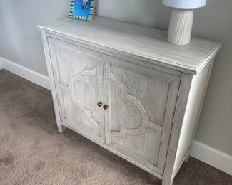 Small 2 door beach-wood style credenza
32” x 35 1/2” x 12 1/2”
lamp with shade 14” tall
6” x 9 seabird picture in frame