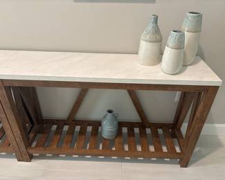 2 beachy wood laminate top hallway tables 32” x 52” x 14”-$220 each
three panel print each 39” x 19 1/2”-$190 set