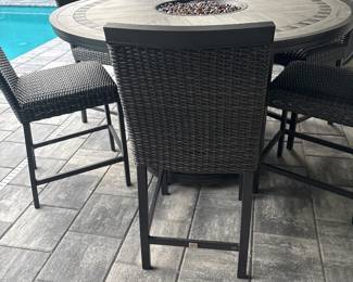 Agio high top fire table with 6 matching chairs 37” x 60” chairs 25” x 19” x 20”-$750