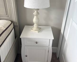 small white nighstand with drawer and cabinet 23 “ x 13” x 17”-$60
white washed metal lamp with shade 24” tall-$35