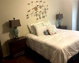 King bed/mattress. End table part of furniture set.