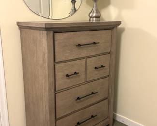 Tall wood dresser.