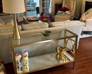 Gold console table and decor.