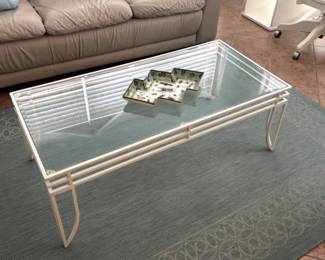 Iron and glass coffee table.