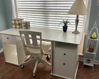 White desk and filing drawers.