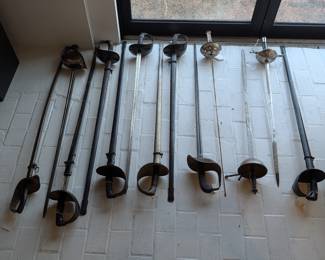 Large collection of swords, knives, and spears available