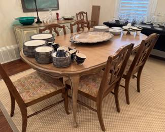 Table and 8 chairs. Selling separately.