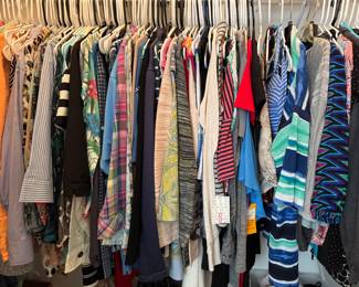 A lot of new with tags clothing. Various sizes