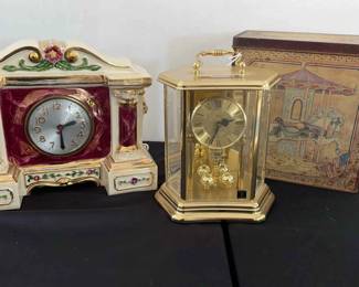 Vintage 1930s Ceramic Electric Clock, Bulova Quartz Table Clock, And Vintage Tin Storage Container