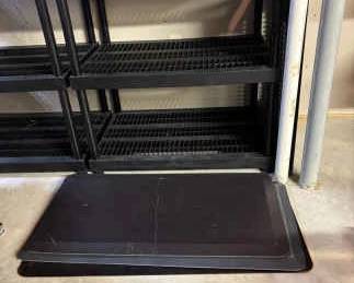 Four Plastic Shelving Units Rubber Floor Mats
