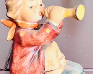Girl playing a horn