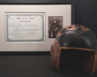 Antique Football helmet and framed certificate