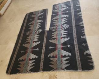 poncho blanket (sometimes called a serape poncho or saddle blanket poncho)