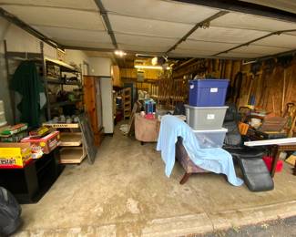 Garbage full of tools and garden items…still unpacking
