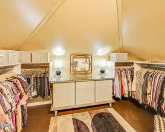 Rug and clothing are for sale.