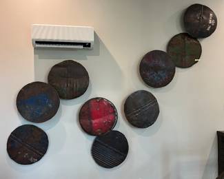 Amazing tin drum heads as decor.
