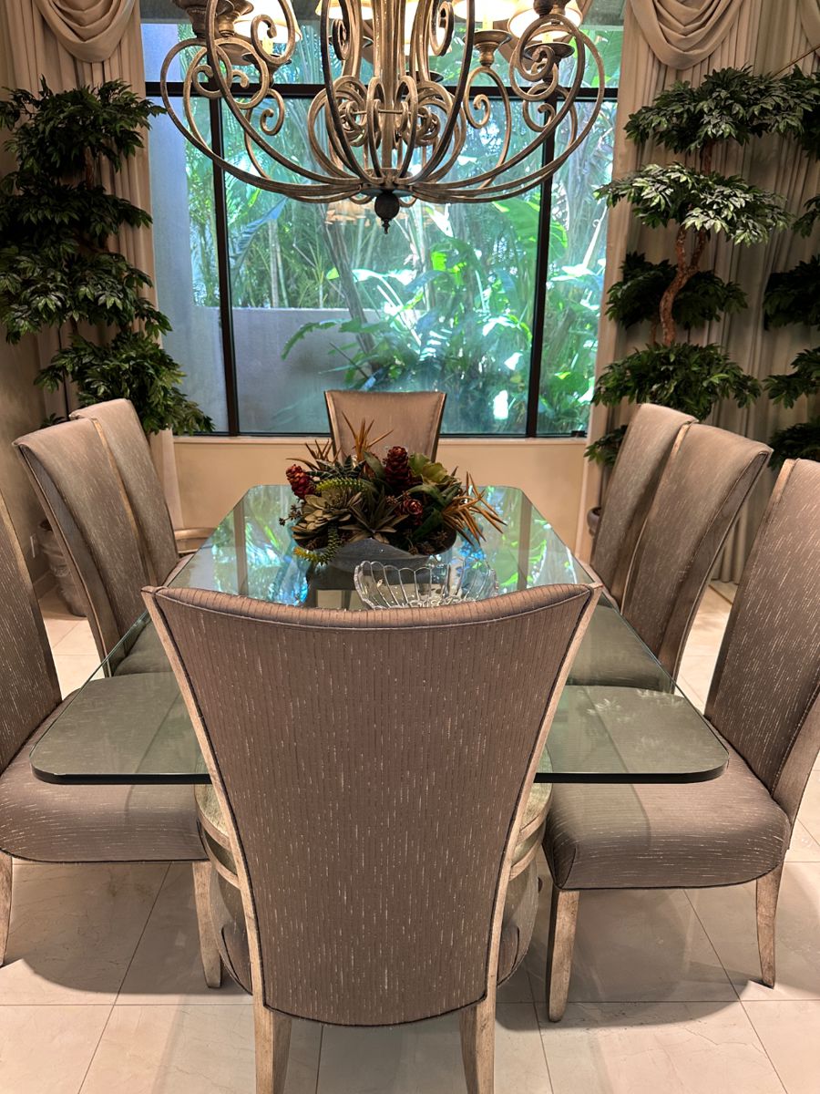 Modern dining room table and 8 chairs. Thick Glass top