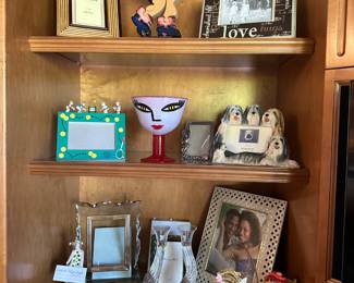 lots of photo frames and COSA BODA GLASS