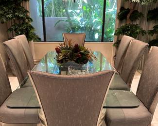Modern dining room table and 8 chairs. Thick Glass top