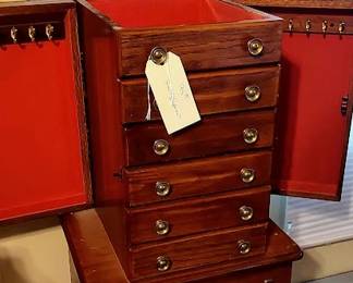 Jewelry Armoire with as found front left foot - looks to have been gnawed on by dog. $95