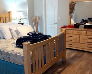 Blonde BR set complete with headboard, footboard, frame, mattress, boxsprings, triple dresser and 2 night stands $450.