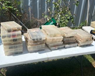 Various containers of fishing lures 
