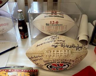 Signed and unsigned rare Husker footballs