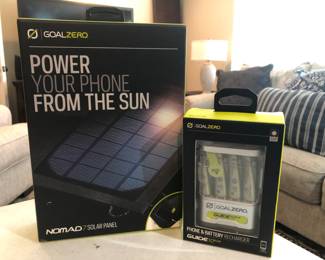 Goal 0. Nomad solar pad for phone.  Plus phone and battery charged.  Both new in box still sealed