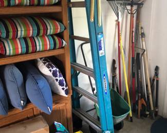 Ladder, garden tools, cushions for the yard chairs, garden supplies