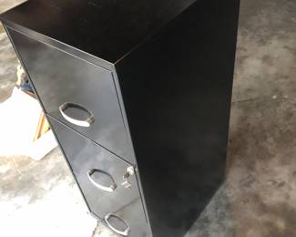Letter size file cabinet with lock and key.  File folders.  