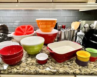 Red Staub Lasagne baking pan
Melamine Storage bowls with lids 
Multicolor Ramekins
Red Silicone pie pan