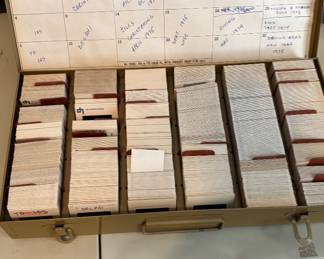 various cases of vintage slides from around the world 