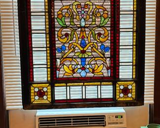 Large antique stained glass window