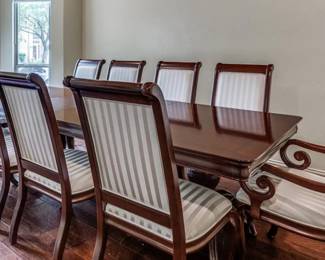 Elegant Dining table with leaves and 10 Chairs for entertaining!