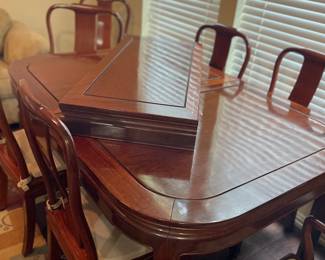 Beautiful dining table with eight chairs and two leaves