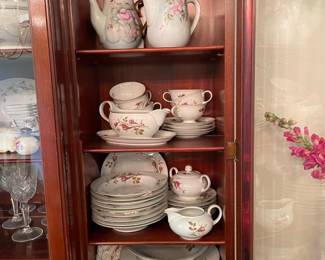 set of china and hand painted tea pots