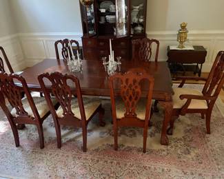 This table and chairs are magnificent! The table is beautifully inlaid and comes with leaves and pads..all like new