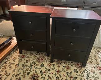 pair of clean line black and mahogany side tables