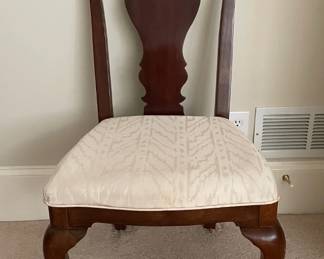 Beautiful antique armless chair there is an armed matching chair