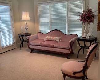 Fenton style side tables, antique camel back loveseat, antique upholstered chair, china lamp and figurine