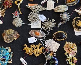 BROOCHES