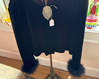 BEAUTIFUL VINTAGE BLACK VELVET JACKET WITH FUR CUFFS AND RHINESTONE WATERWALL BROOCH.  SOLD SEPERATELY