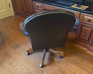 Black Leather nail head executive office chair swivel, tilts and lifts. $290