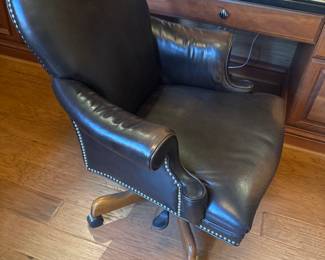 Black Leather nail head executive office chair swivel, tilts and lifts. $290