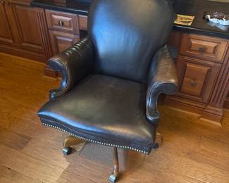 Black Leather nail head executive office chair swivel, tilts and lifts. $290