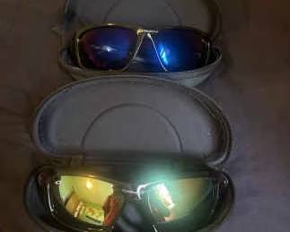 2 Pairs of Oakley Sunglasses