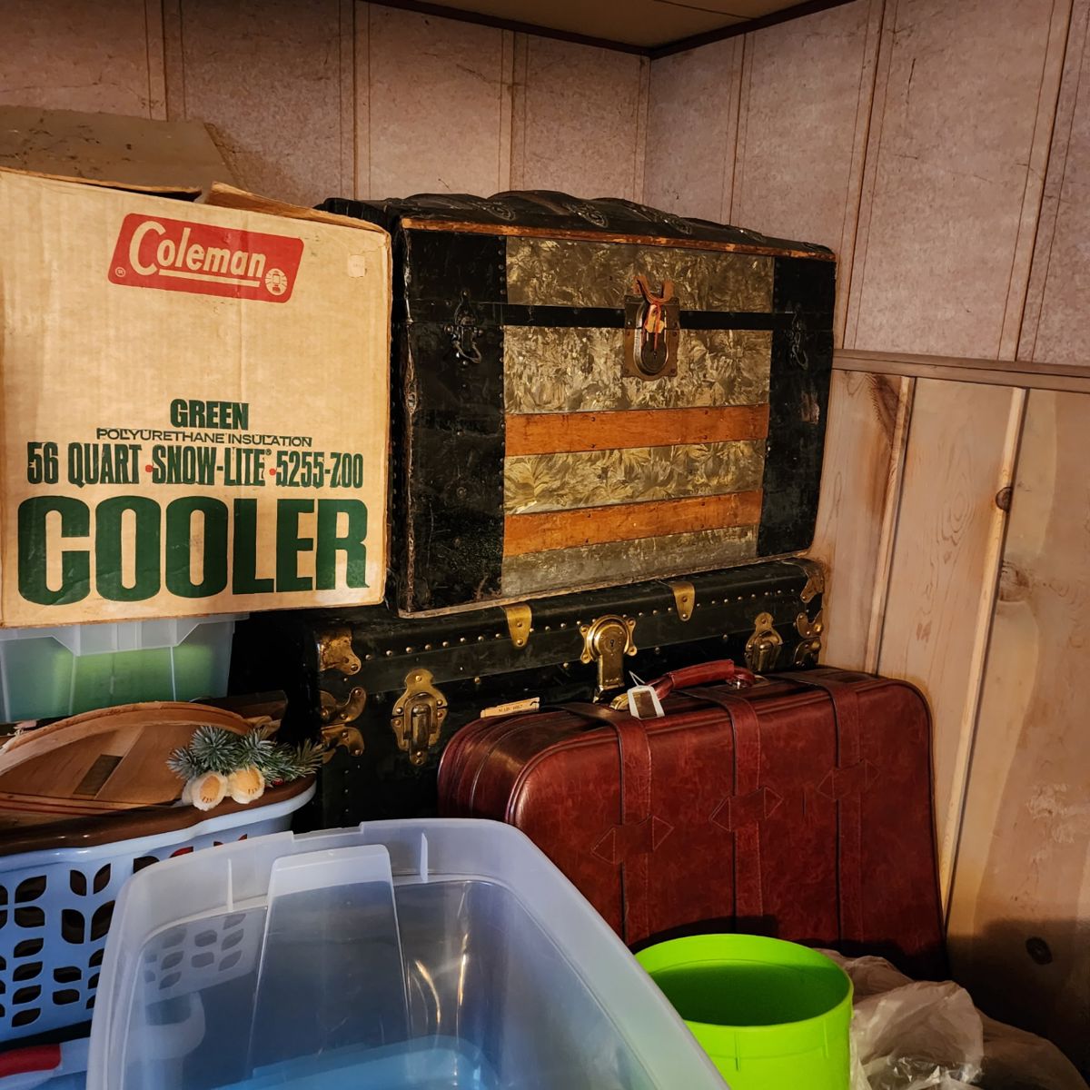 Vintage luggage, trunks, and igloo coolers