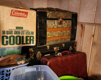 Vintage luggage, trunks, and igloo coolers