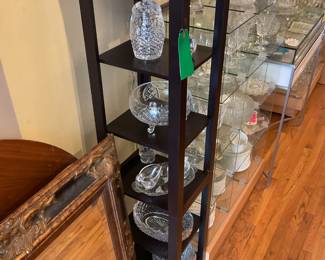 Small black 5 shelf tower 63” tall 1’ x 1’ 